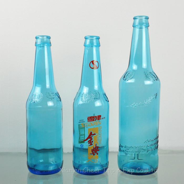 light blue glass beer bottles